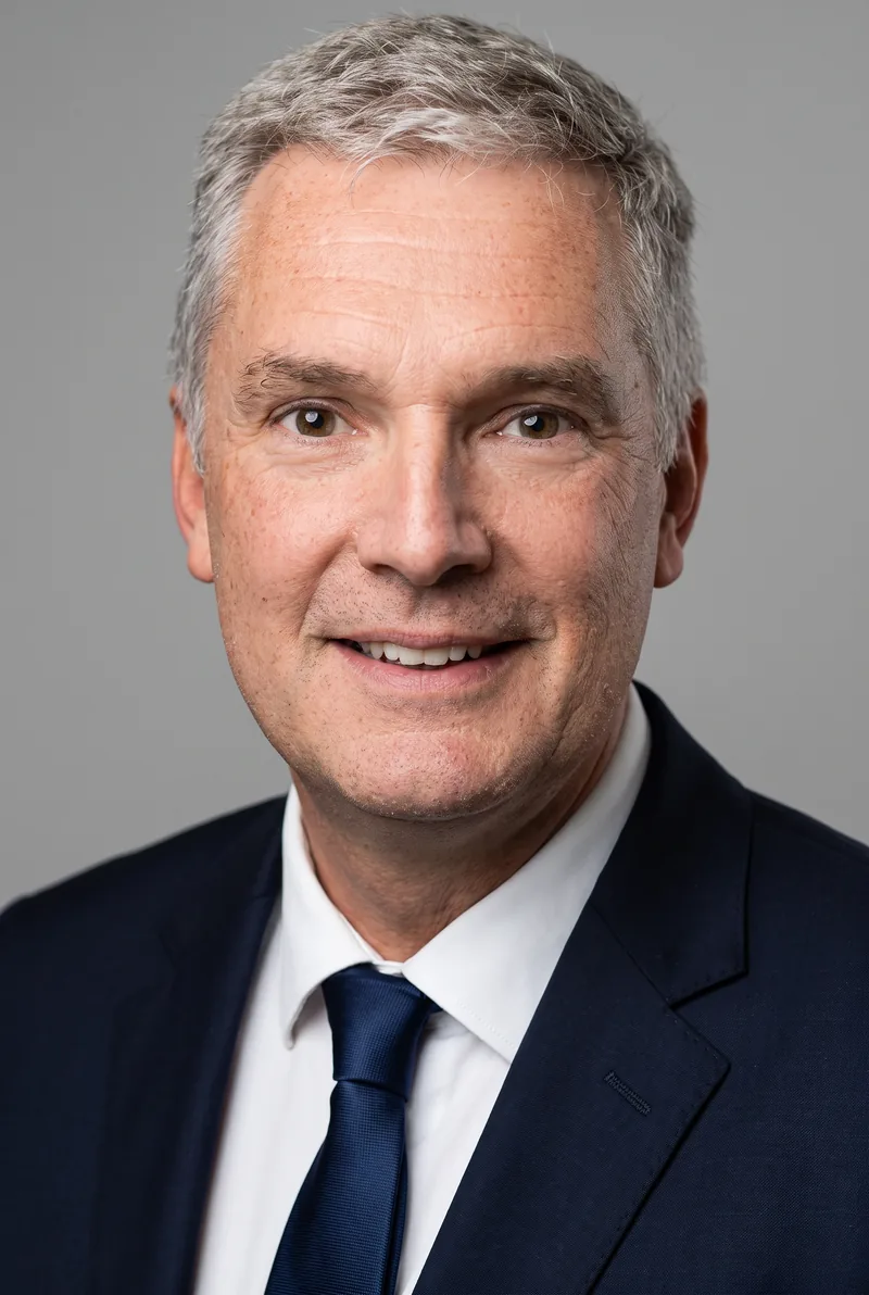 AI-generated portrait of Andrew Gill, keynote speaker