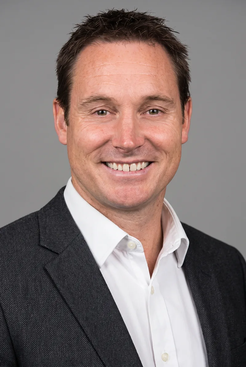 AI-generated portrait of Andrew Mehrtens, keynote speaker