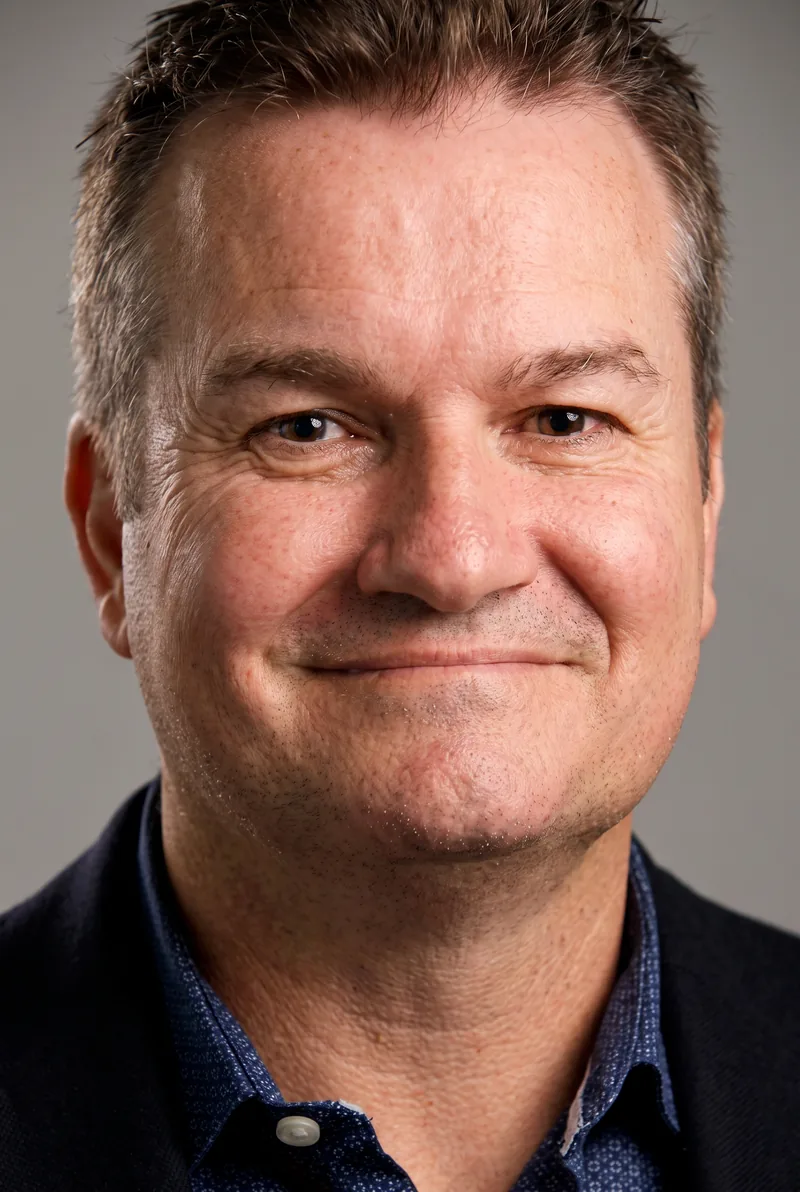 AI-generated portrait of Brett Rutledge, keynote speaker