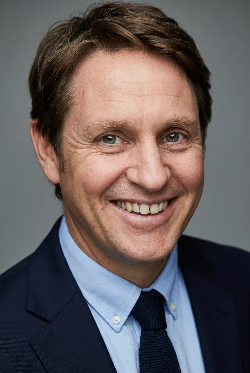 AI-generated portrait of Craig Reucassel, keynote speaker