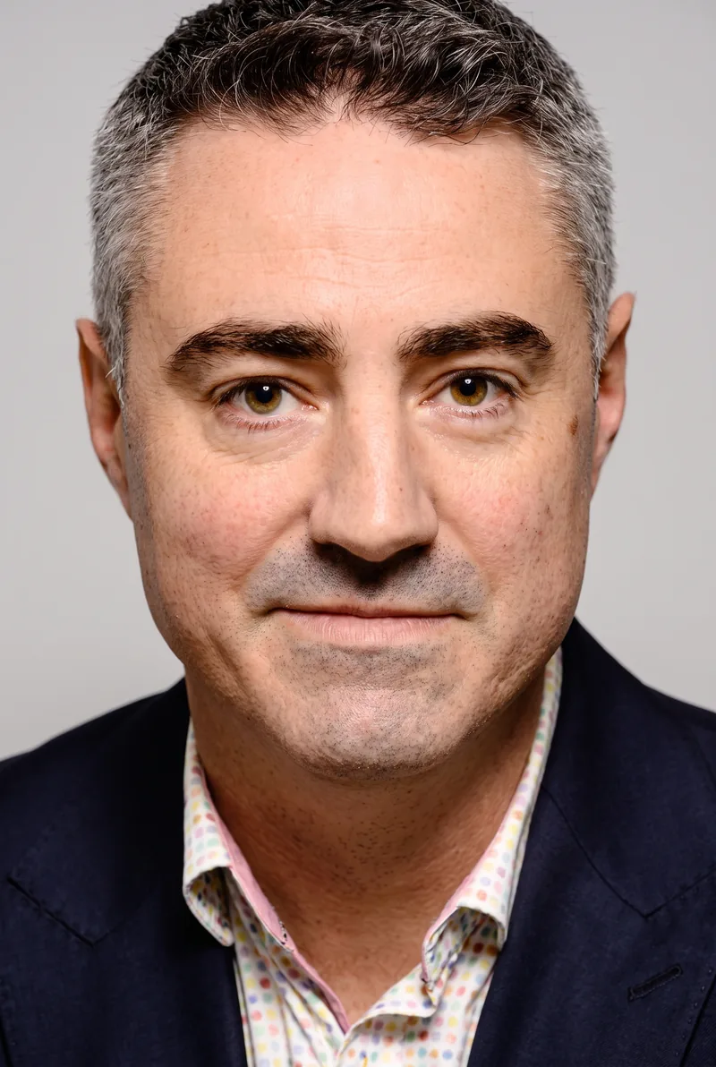 AI-generated portrait of Evan Lucas, keynote speaker