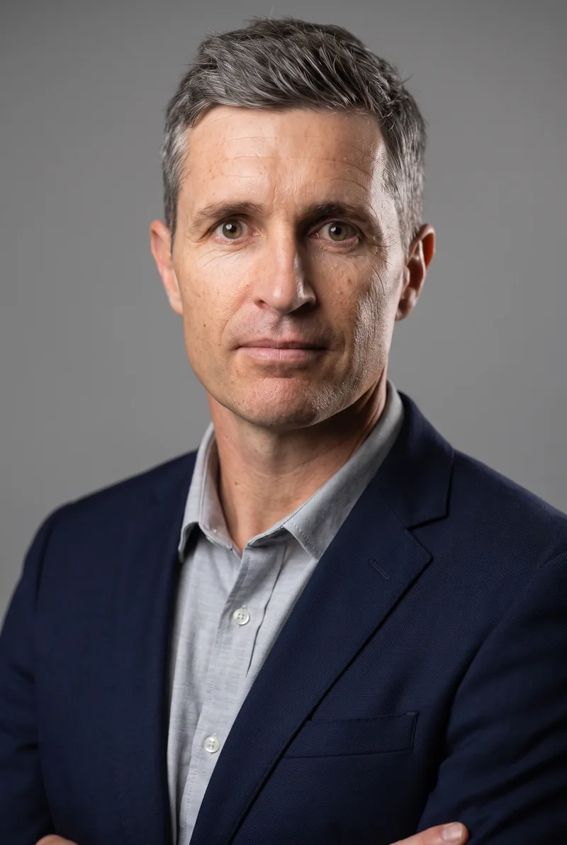 AI-generated portrait of Justin Longmuir, keynote speaker