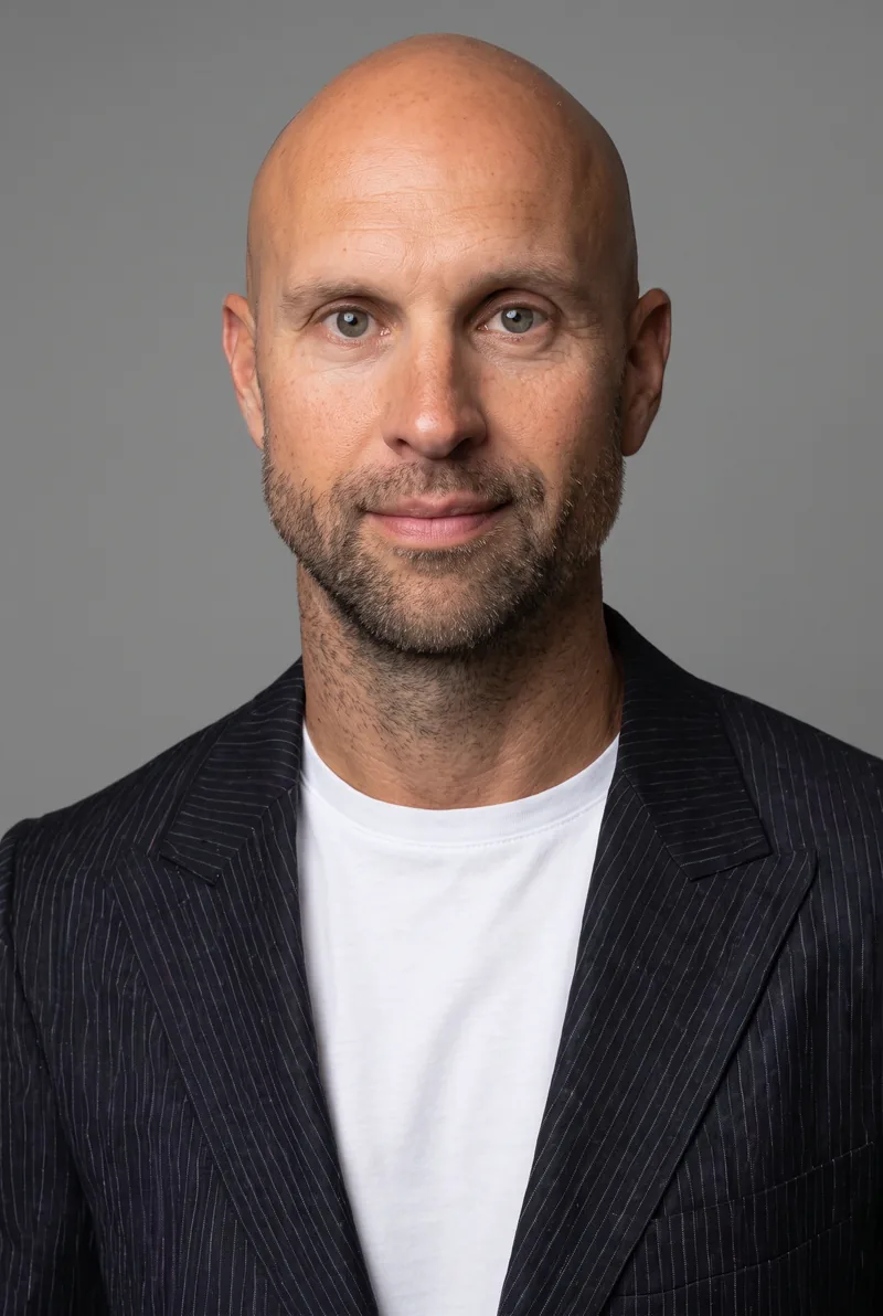 AI-generated portrait of Luke Tyburski, keynote speaker