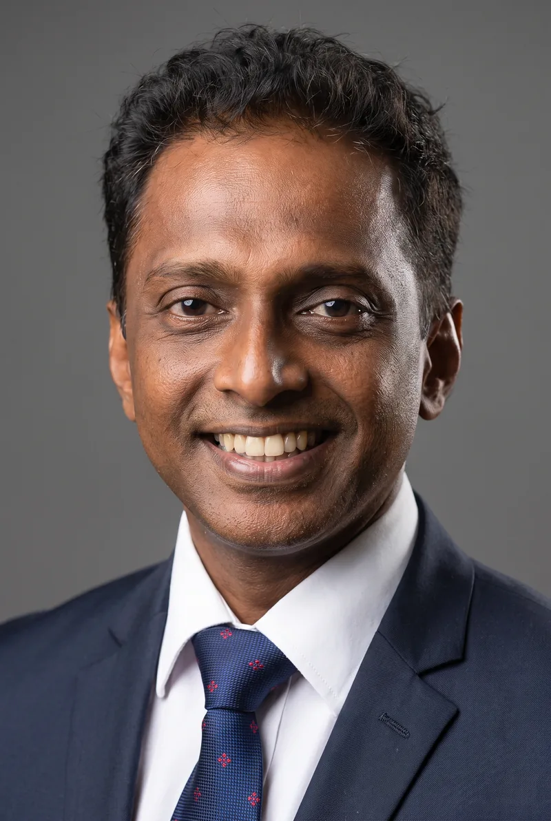 AI-generated portrait of Manoj Menon, keynote speaker