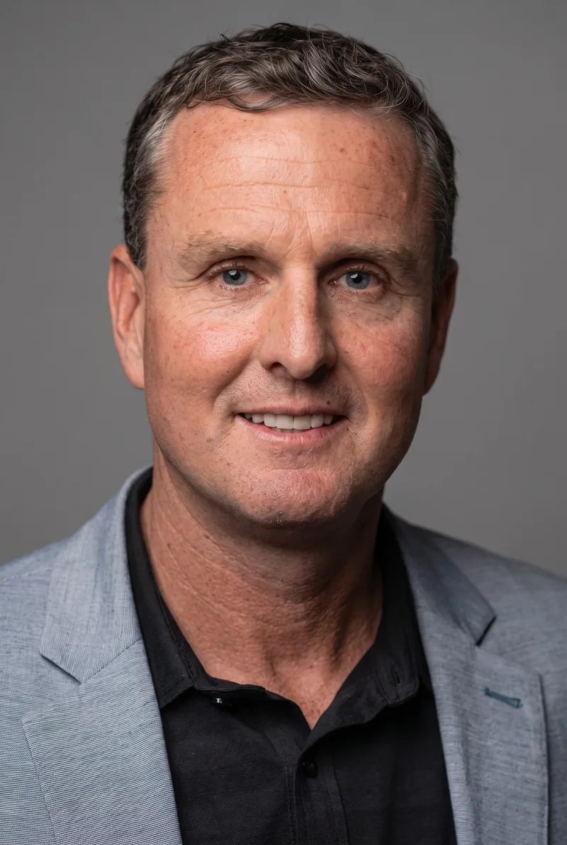 AI-generated portrait of Mark Hughes OAM, keynote speaker