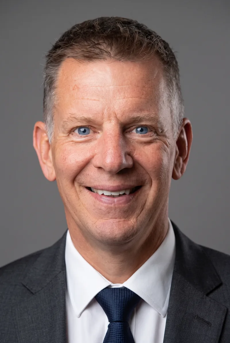AI-generated portrait of Mike Rhodes, keynote speaker