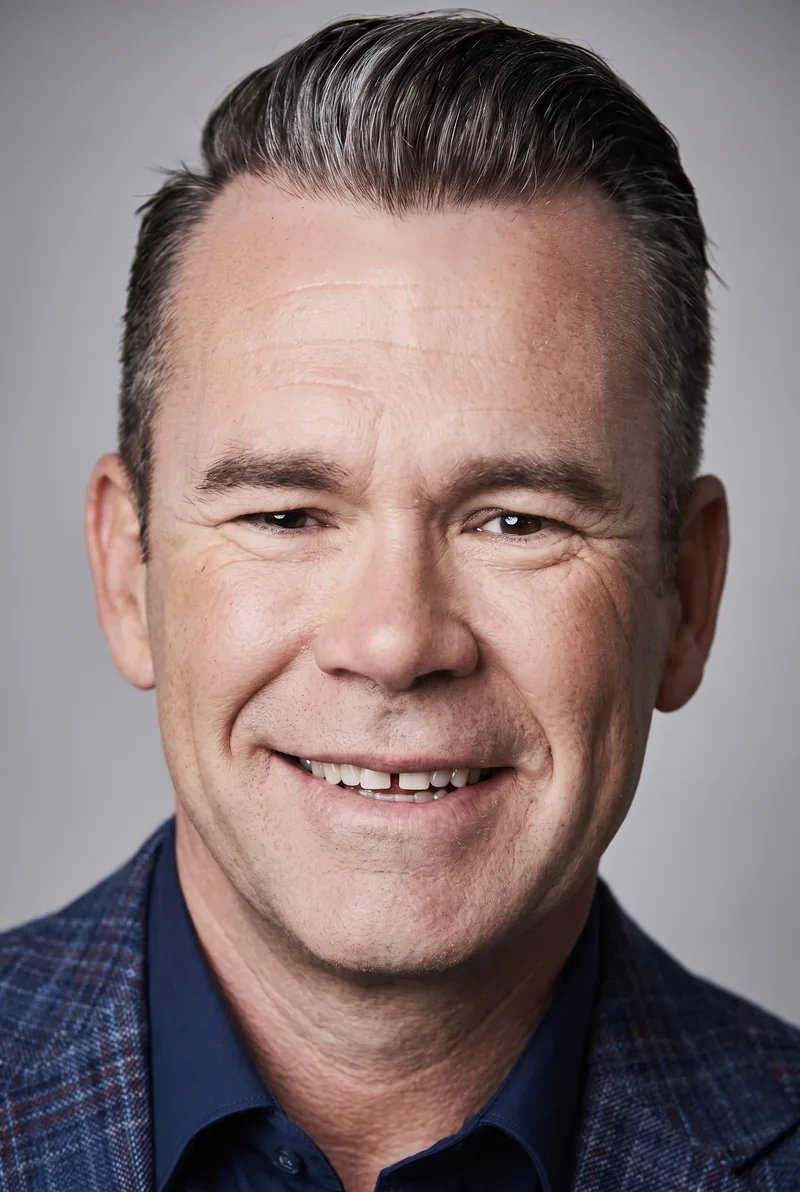 AI-generated portrait of Phil Burton OAM, keynote speaker