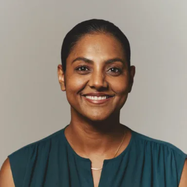 Priya Nandan (AI-generated placeholder image)